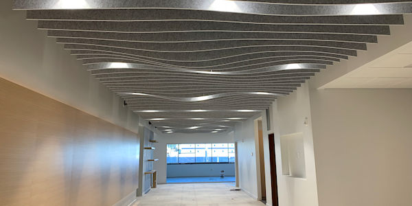 New acoustical ceiling tiles in hallway