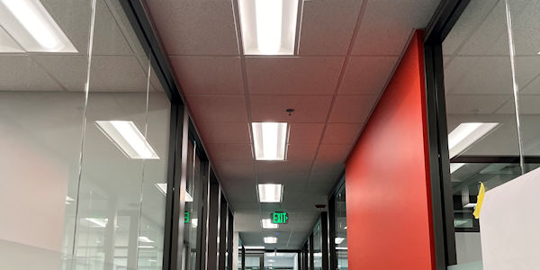 Ceiling tiles installed in hallway