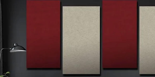 Acoustical tiles on wall in red and tan